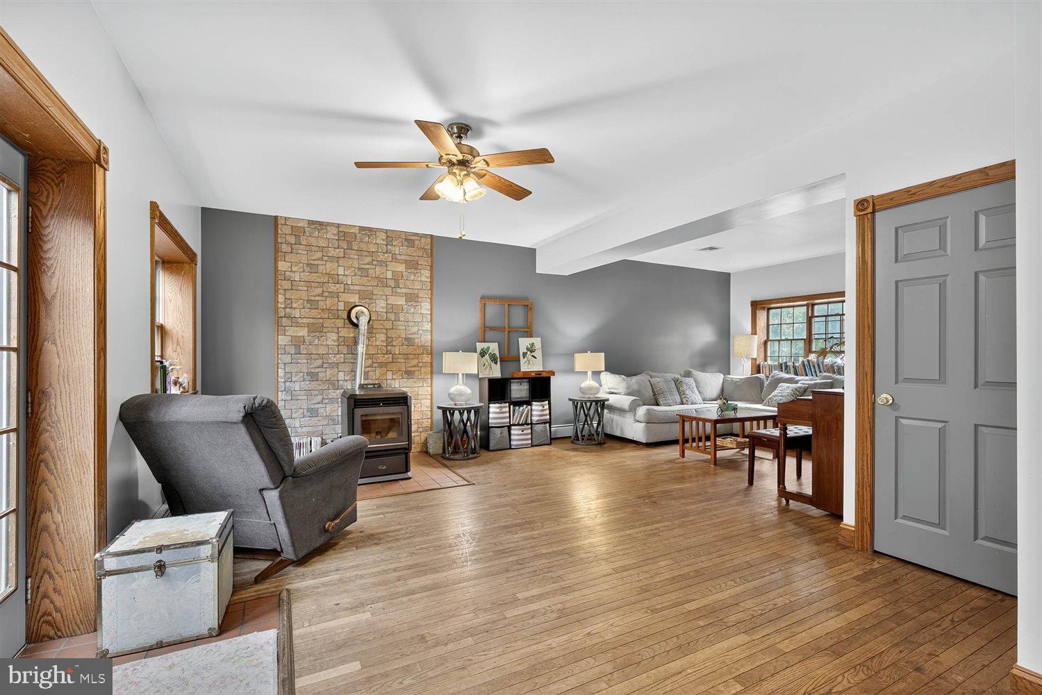 5987 River Road Conestoga, PA 17516 - Photo 3 of 40 a living room with furniture and a fireplace