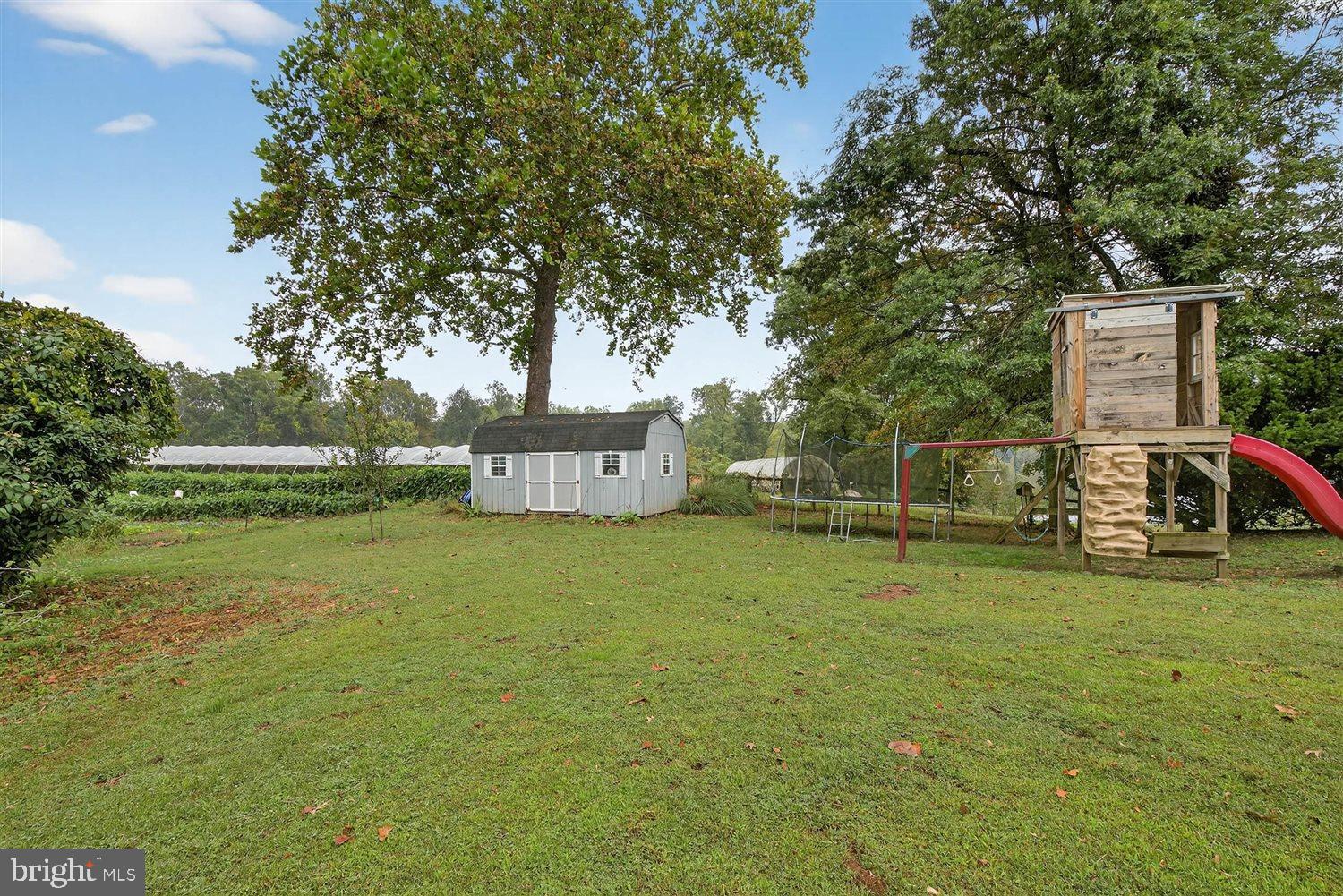 5987 River Road Conestoga, PA 17516 - Photo 32 of 40 a house with trees in the background