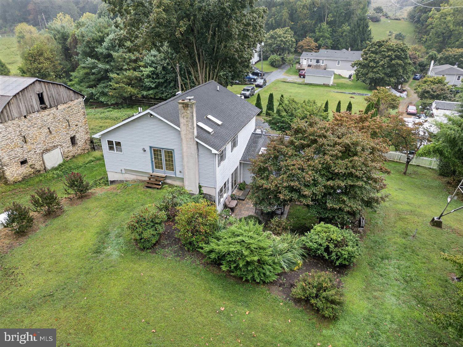 5987 River Road Conestoga, PA 17516 - Photo 34 of 40 an aerial view of a house with a yard