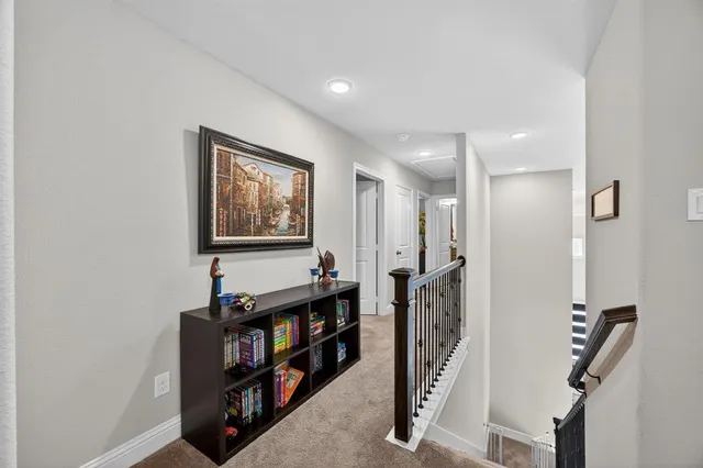 a view of a hallway with workspace