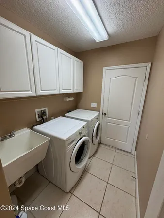 a spacious bathroom with a bathtub and a shower