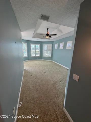 a view of a room with rack on the wall