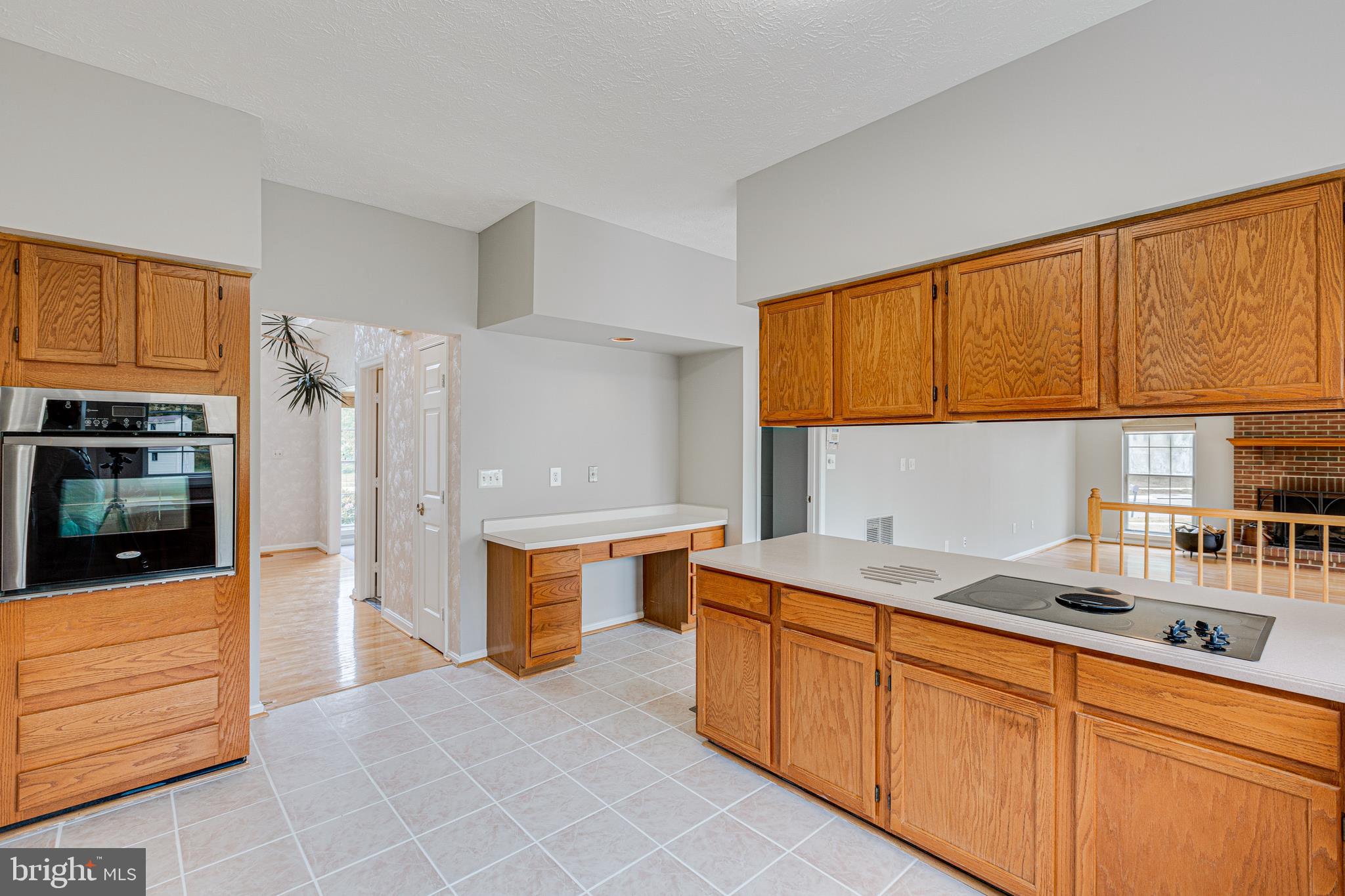 9601 Bald Hill Road Bowie, MD 20721 - Photo 15 of 51 Kitchen with Cooktop, Oven and Microwave