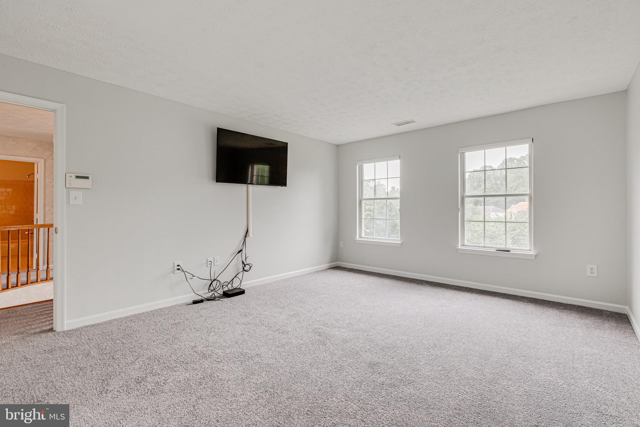 9601 Bald Hill Road Bowie, MD 20721 - Photo 24 of 51 Master Bedroom with Flat Screen TV Conveys