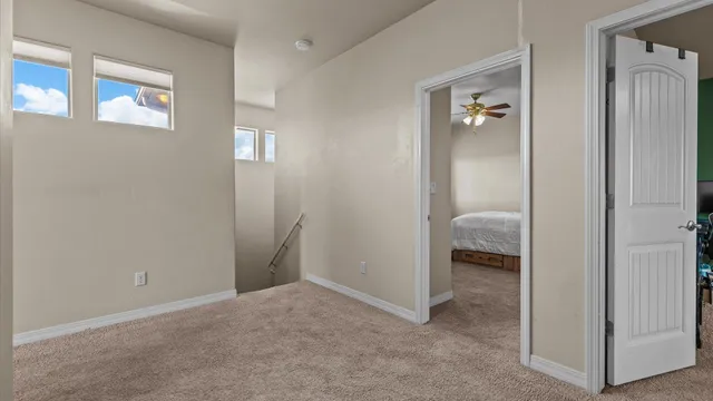 a view of a bedroom from hallway