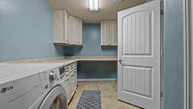 a kitchen with granite countertop a sink and a stove