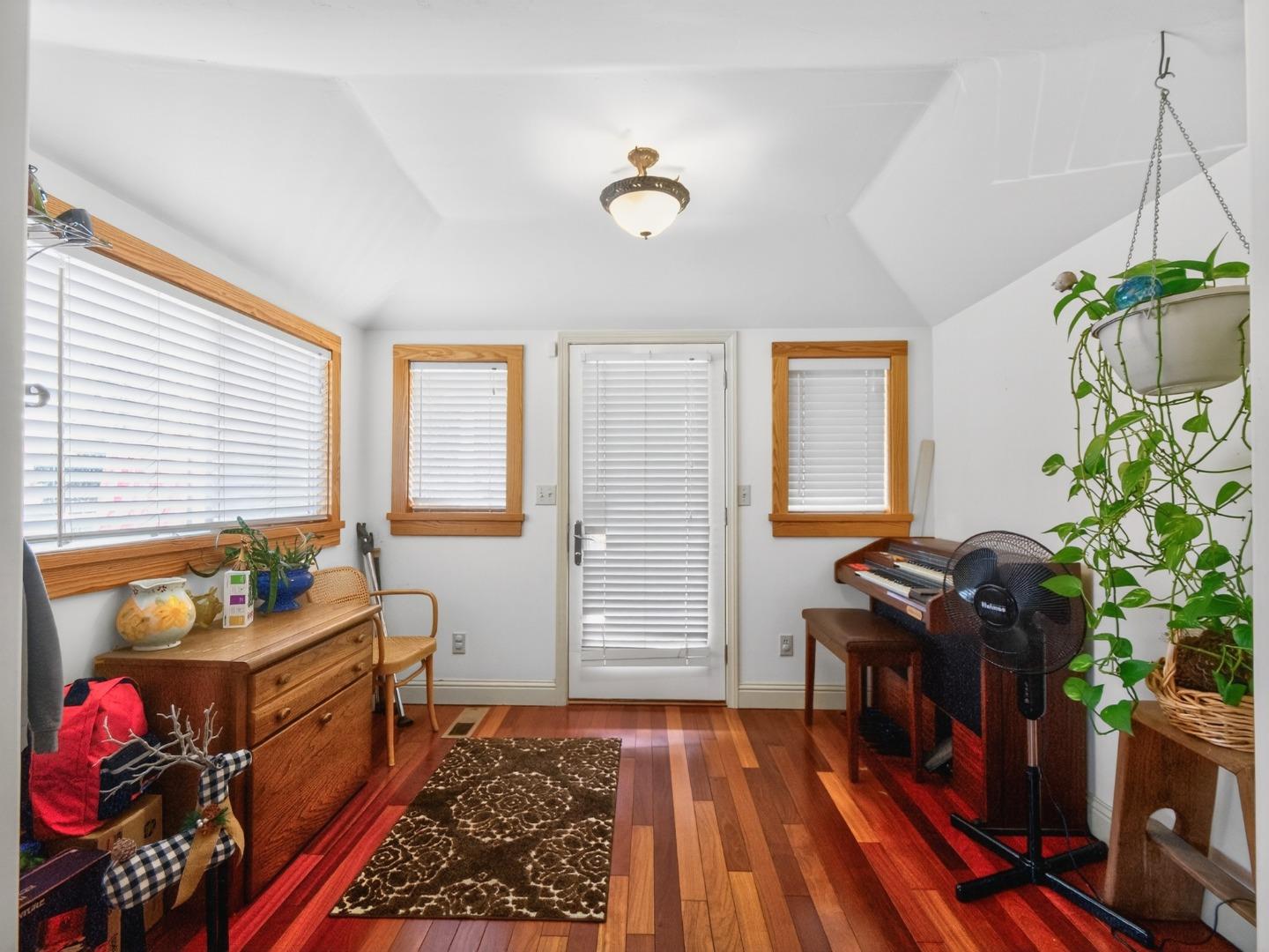 209 Hames Road Watsonville, CA 95076 - Photo 12 of 60 a bedroom with furniture and a window