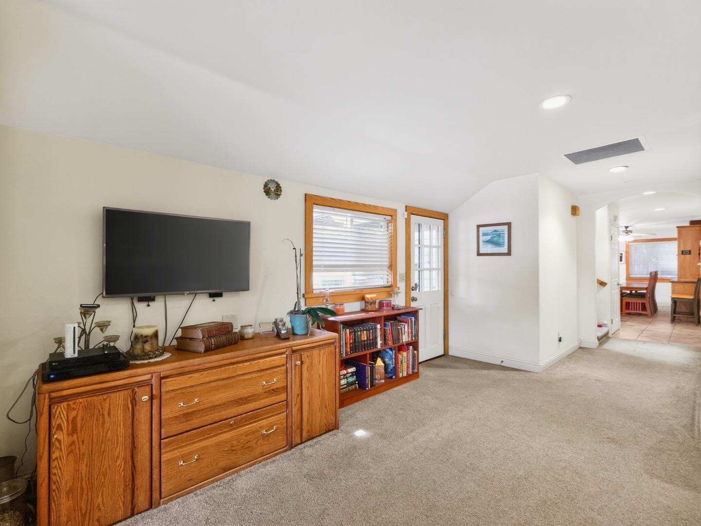 209 Hames Road Watsonville, CA 95076 - Photo 18 of 60 a room with furniture and flat screen tv