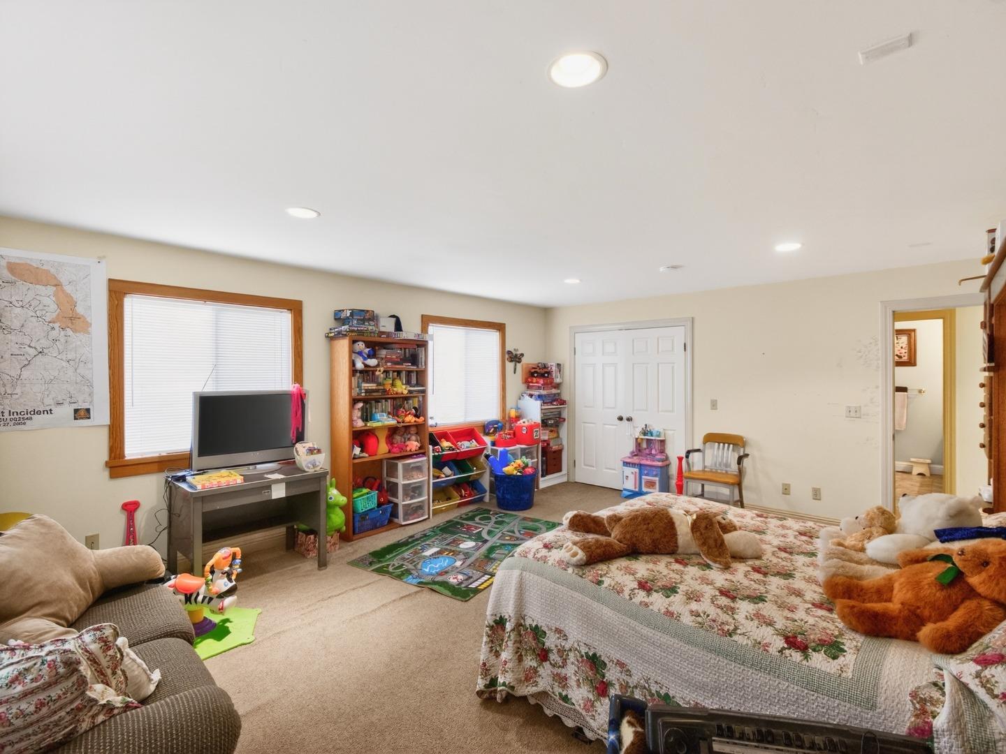 209 Hames Road Watsonville, CA 95076 - Photo 48 of 60 a living room with furniture and a flat screen tv