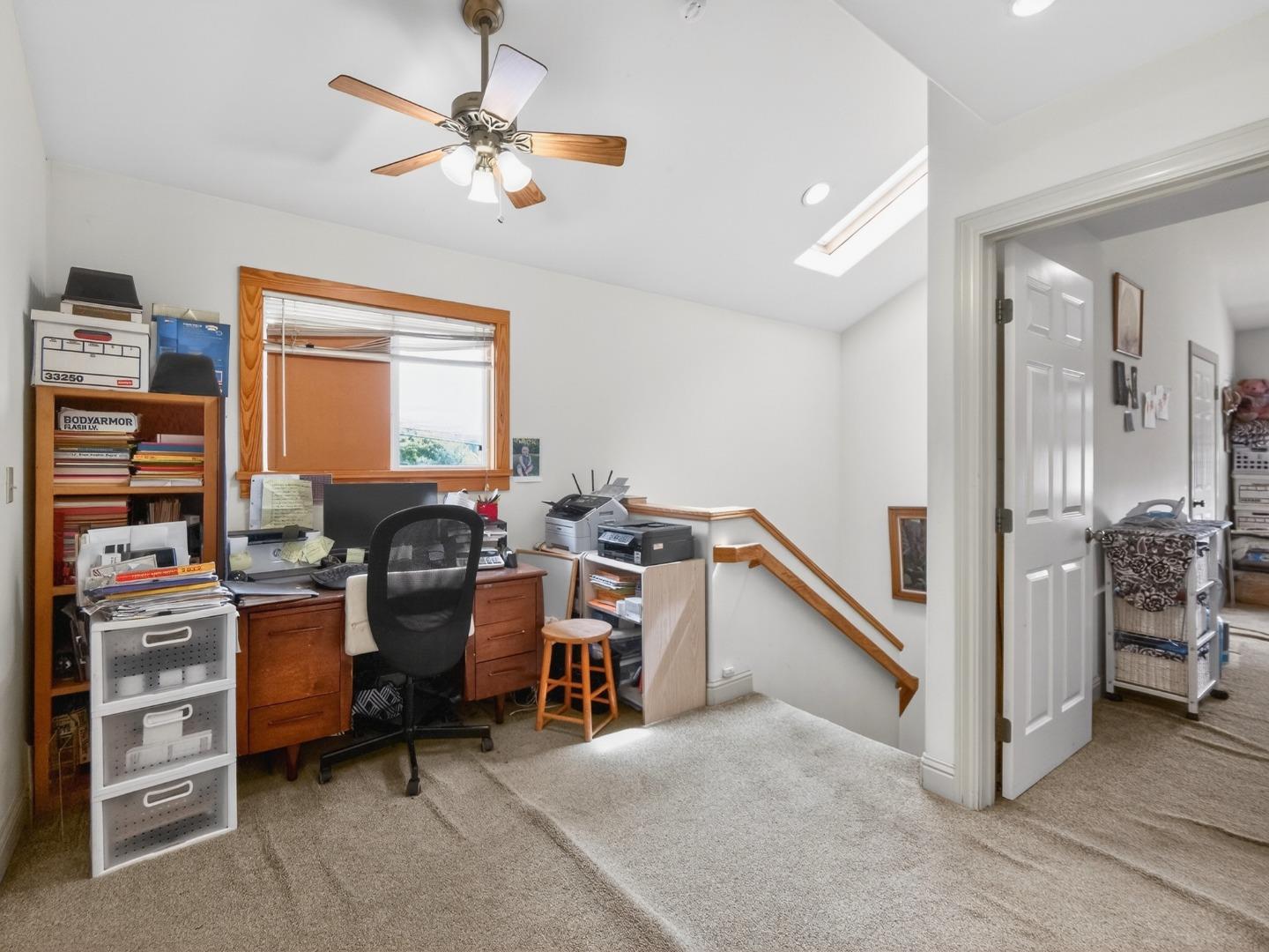 209 Hames Road Watsonville, CA 95076 - Photo 55 of 60 a view of a workspace with furniture and a window