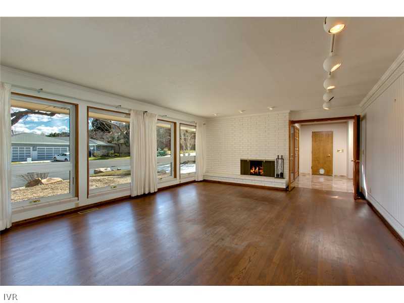 2751 Lake Ridge Reno, NV 89519 - Photo 3 of 25 a view of a big room with wooden floor and windows