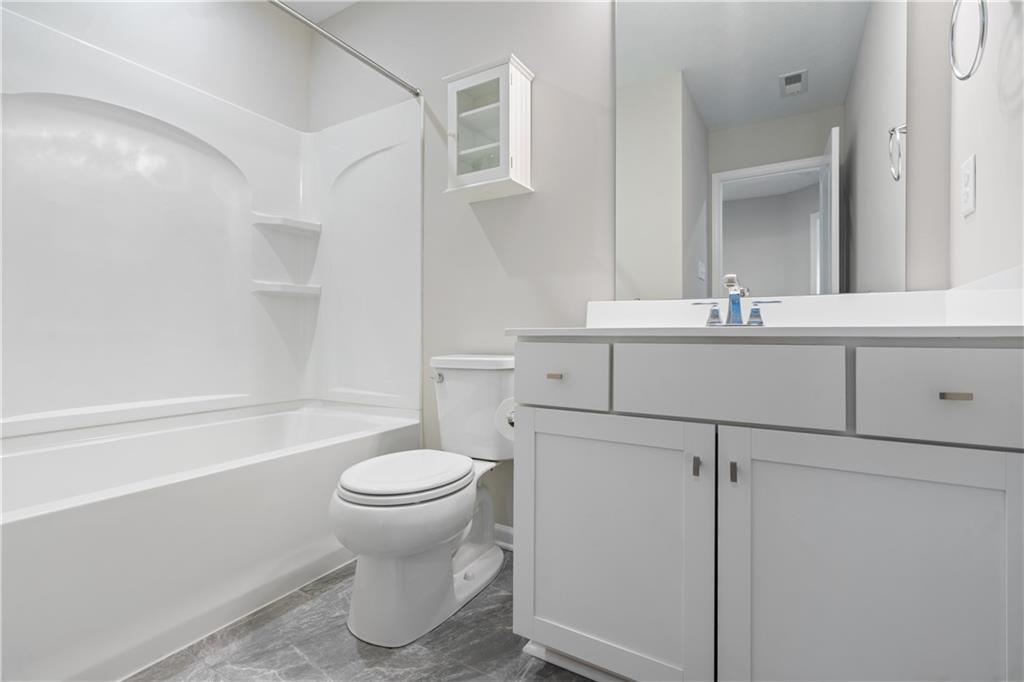107 Affinity Drive Harmony, PA 16037 - Photo 27 of 49 a bathroom with a sink a toilet and a bathtub