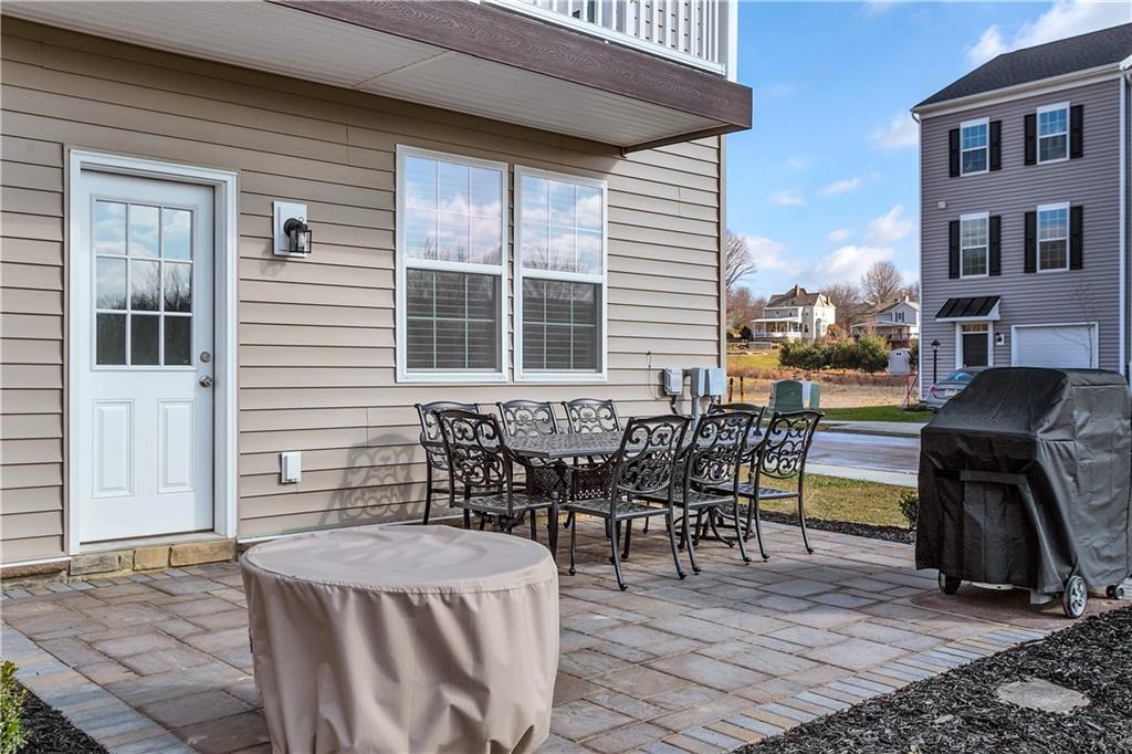 107 Affinity Drive Harmony, PA 16037 - Photo 37 of 49 a view of a patio with table and chairs