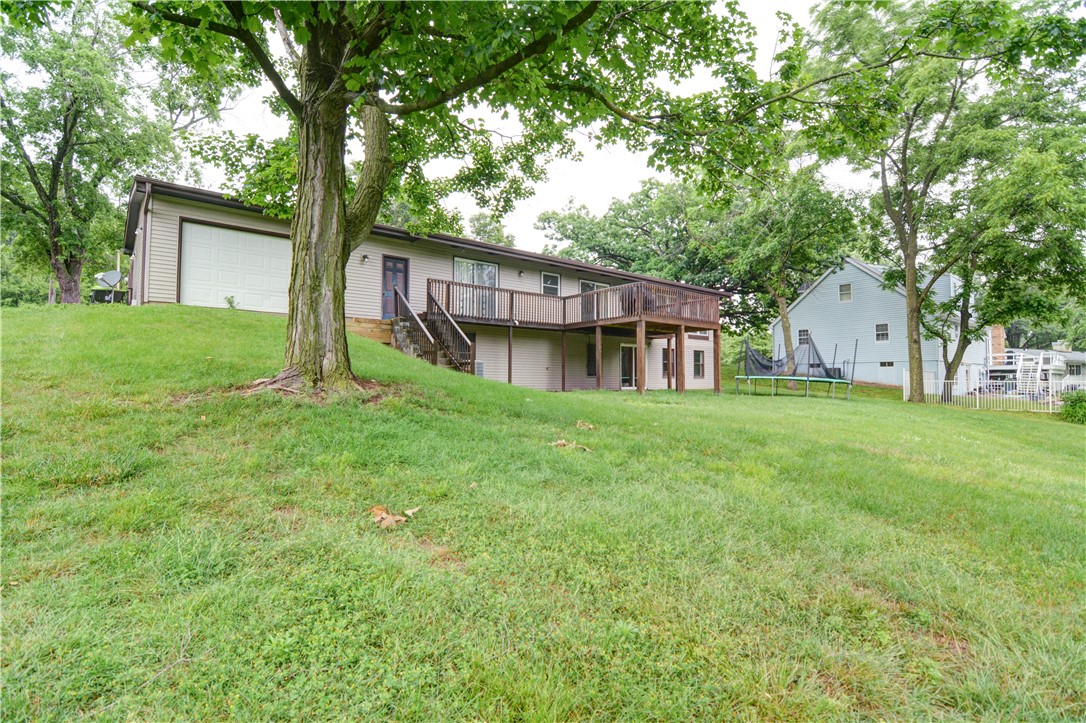 3119 East Fitzgerald Road Decatur, IL 62521 - Photo 33 of 42 a house view with a garden space
