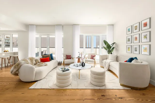a dining room with furniture and wooden floor