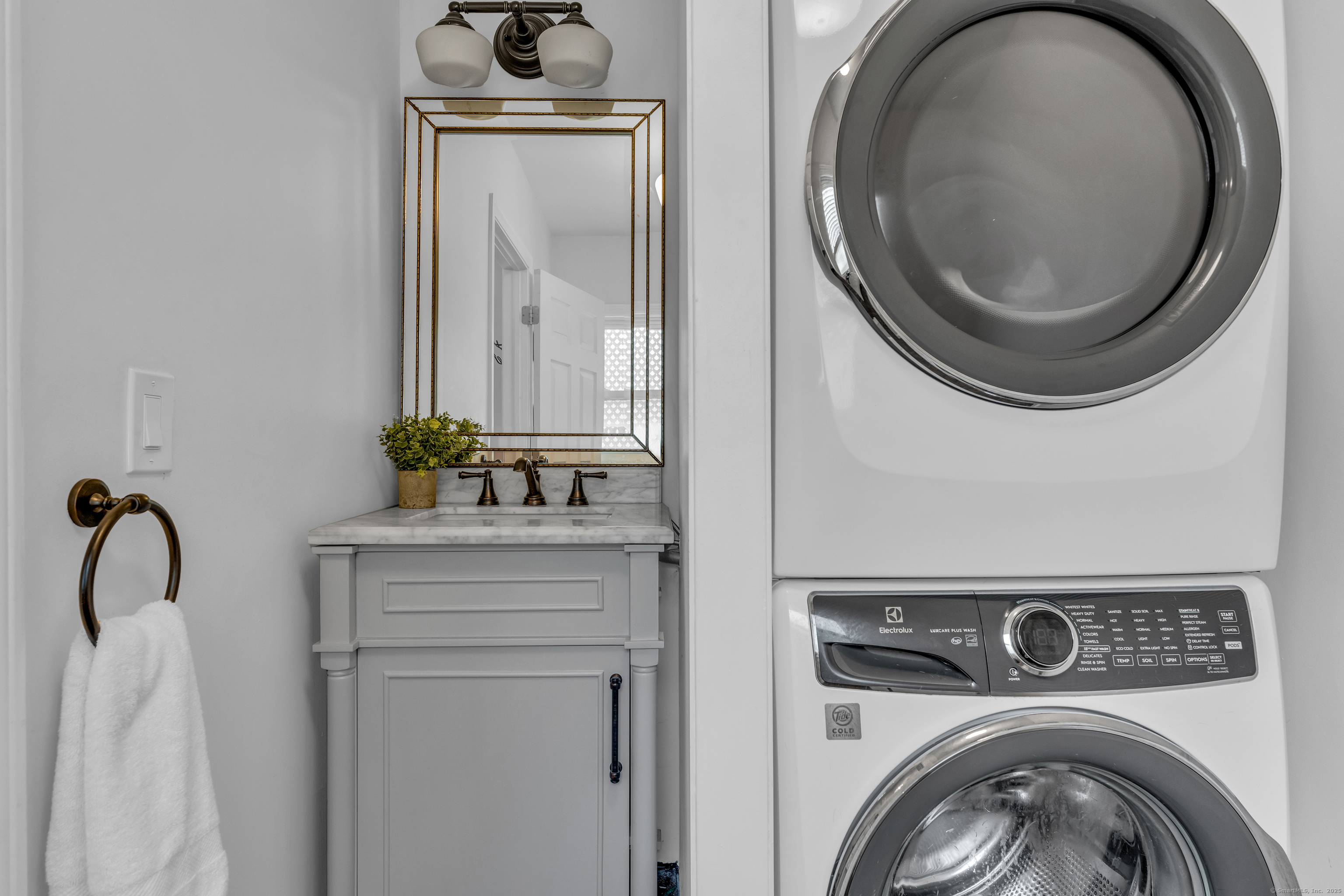90 Cedar Hill Road Guilford, CT 06437 - Photo 31 of 38 Half bathroom with laundry