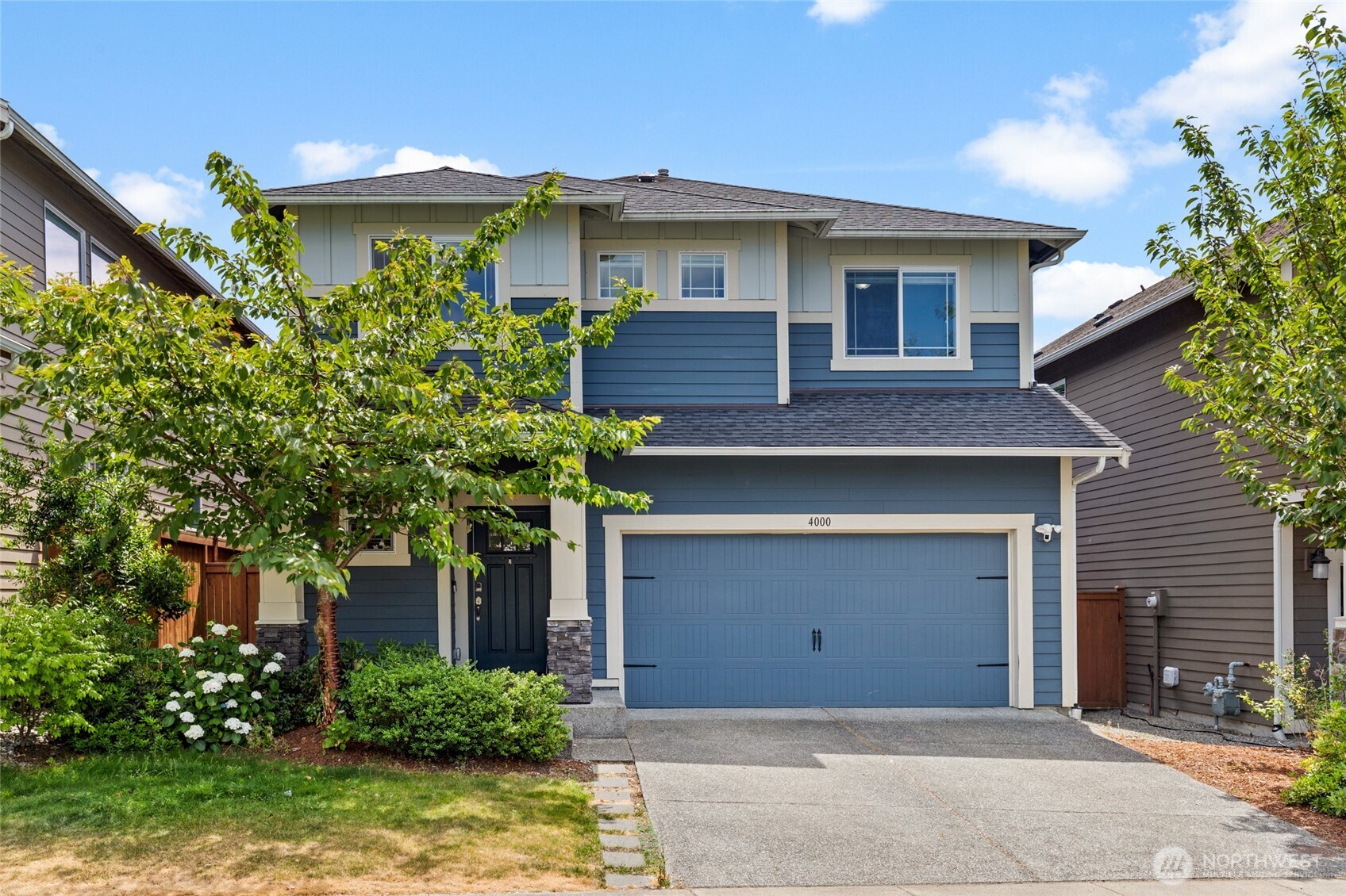 4000 174th Street Southeast Bothell, WA 98012 - Photo 1 of 39 a front view of a house with trees