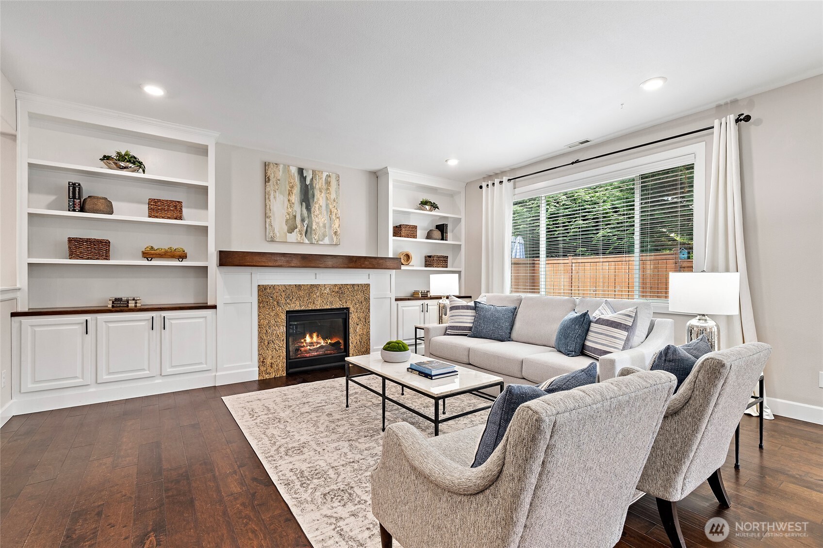 4000 174th Street Southeast Bothell, WA 98012 - Photo 10 of 39 a living room with furniture and a fireplace
