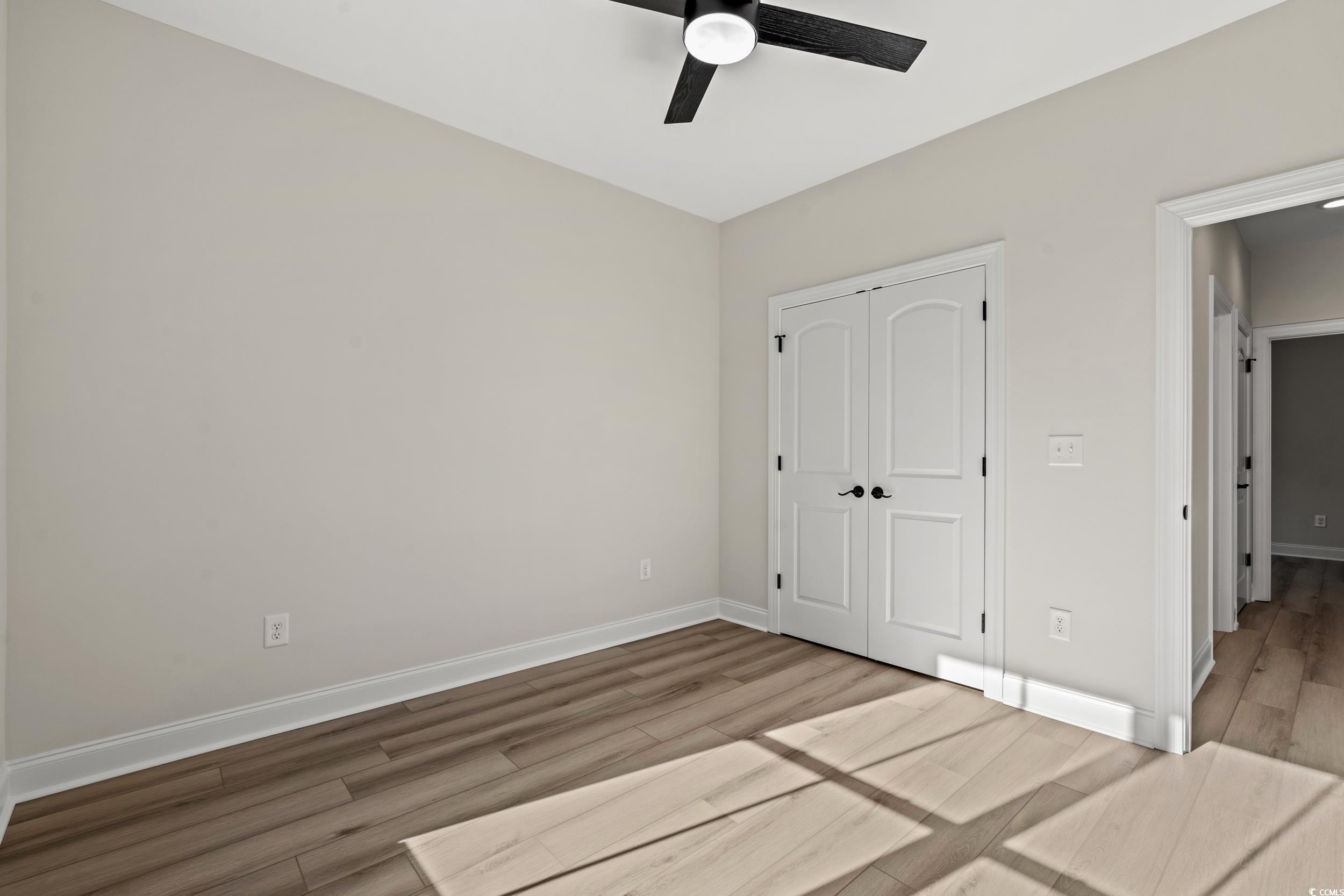 216 William Nobles Road Aynor, SC 29511 - Photo 27 of 37 Unfurnished bedroom with hardwood / wood-style flo