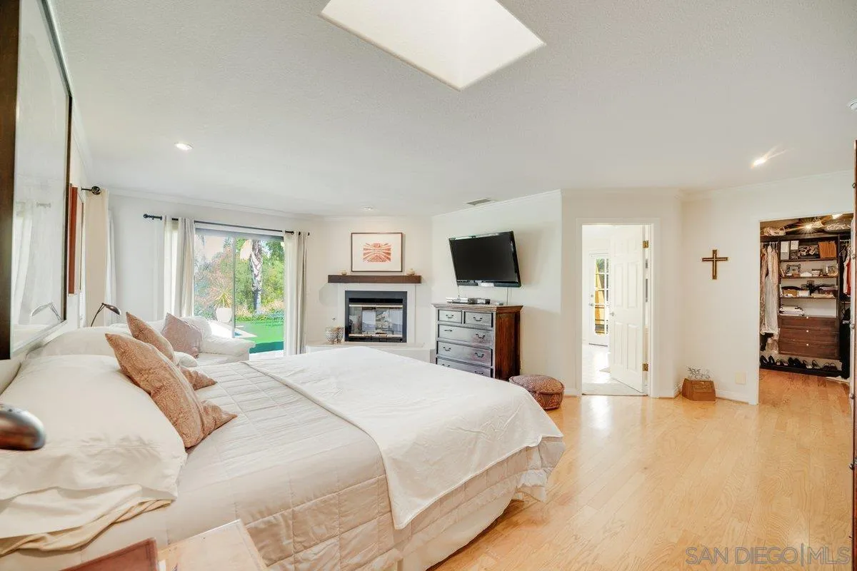 11 Country Glen Road Fallbrook, CA 92028 - Photo 24 of 75 a bedroom with a bed and a flat screen tv