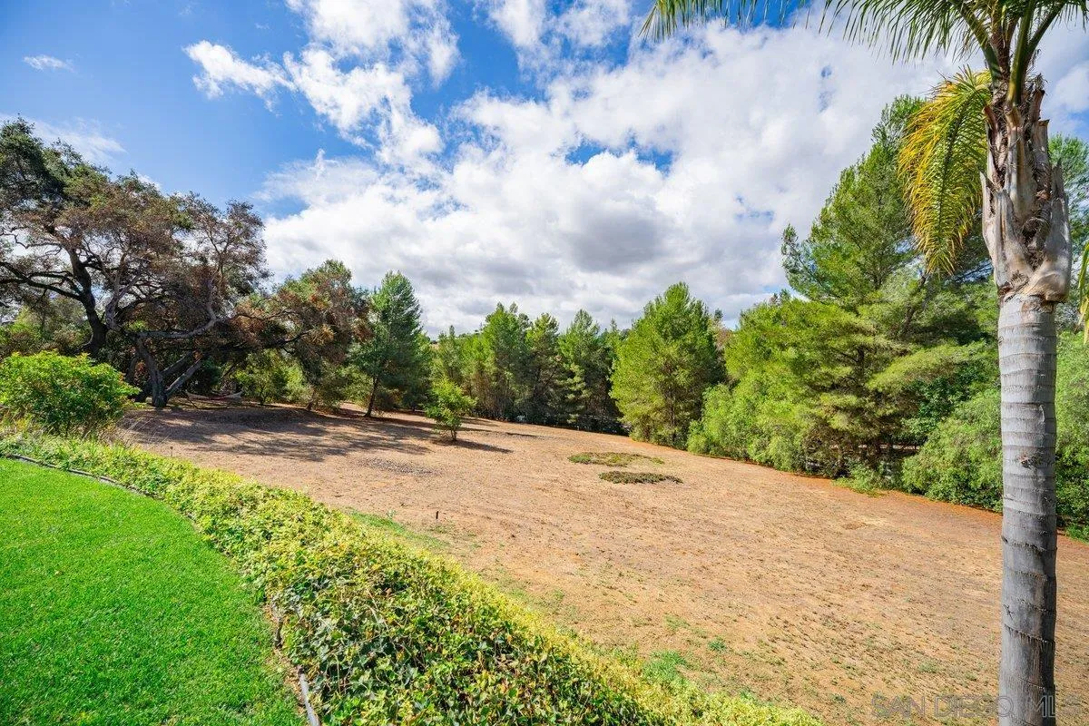 11 Country Glen Road Fallbrook, CA 92028 - Photo 48 of 75 a view of a backyard of a house with a garden