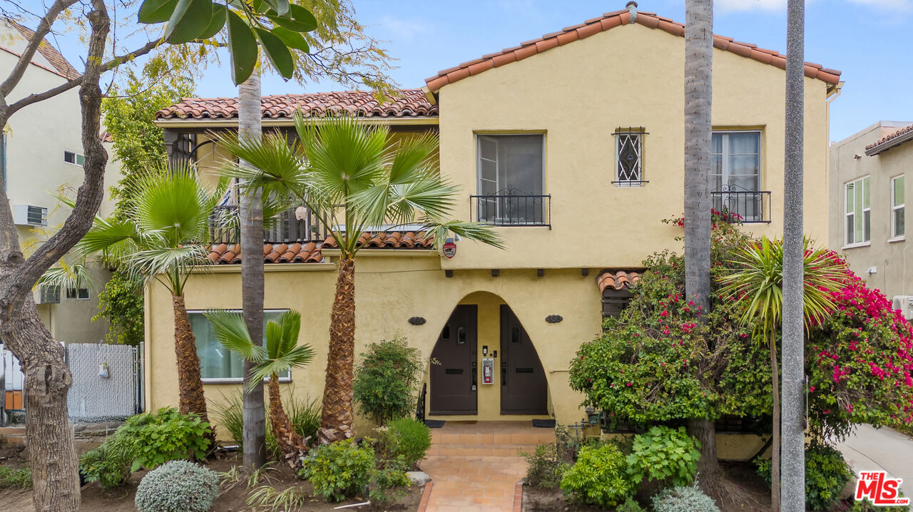 458 North Genesee Avenue Los Angeles, CA 90036 - Photo 1 of 38 a front view of a house with garden
