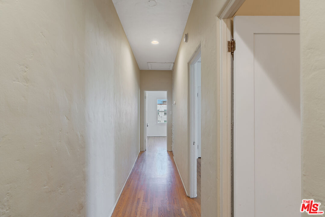 458 North Genesee Avenue Los Angeles, CA 90036 - Photo 17 of 38 a view of a hallway with wooden floor