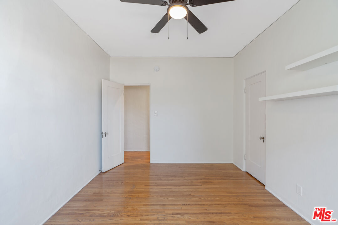 458 North Genesee Avenue Los Angeles, CA 90036 - Photo 26 of 38 a view of empty room with wooden floor