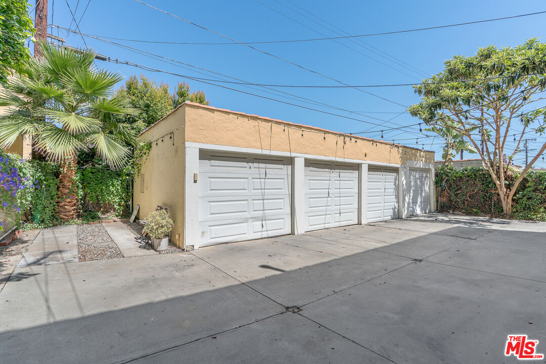 458 North Genesee Avenue Los Angeles, CA 90036 - Photo 34 of 38 a view of a house with a garage