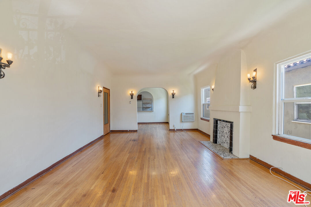 458 North Genesee Avenue Los Angeles, CA 90036 - Photo 6 of 38 a view of a room with wooden floor