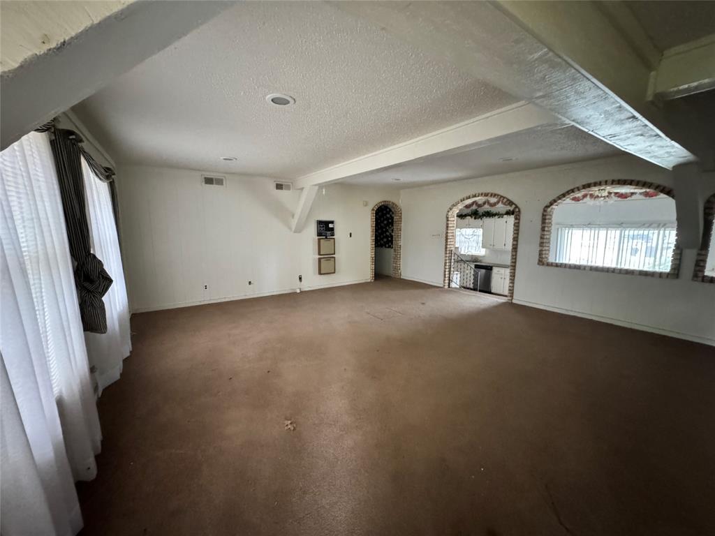 3909 Smothers Road Caney City, TX 75148 - Photo 5 of 35 a view of empty room with windows