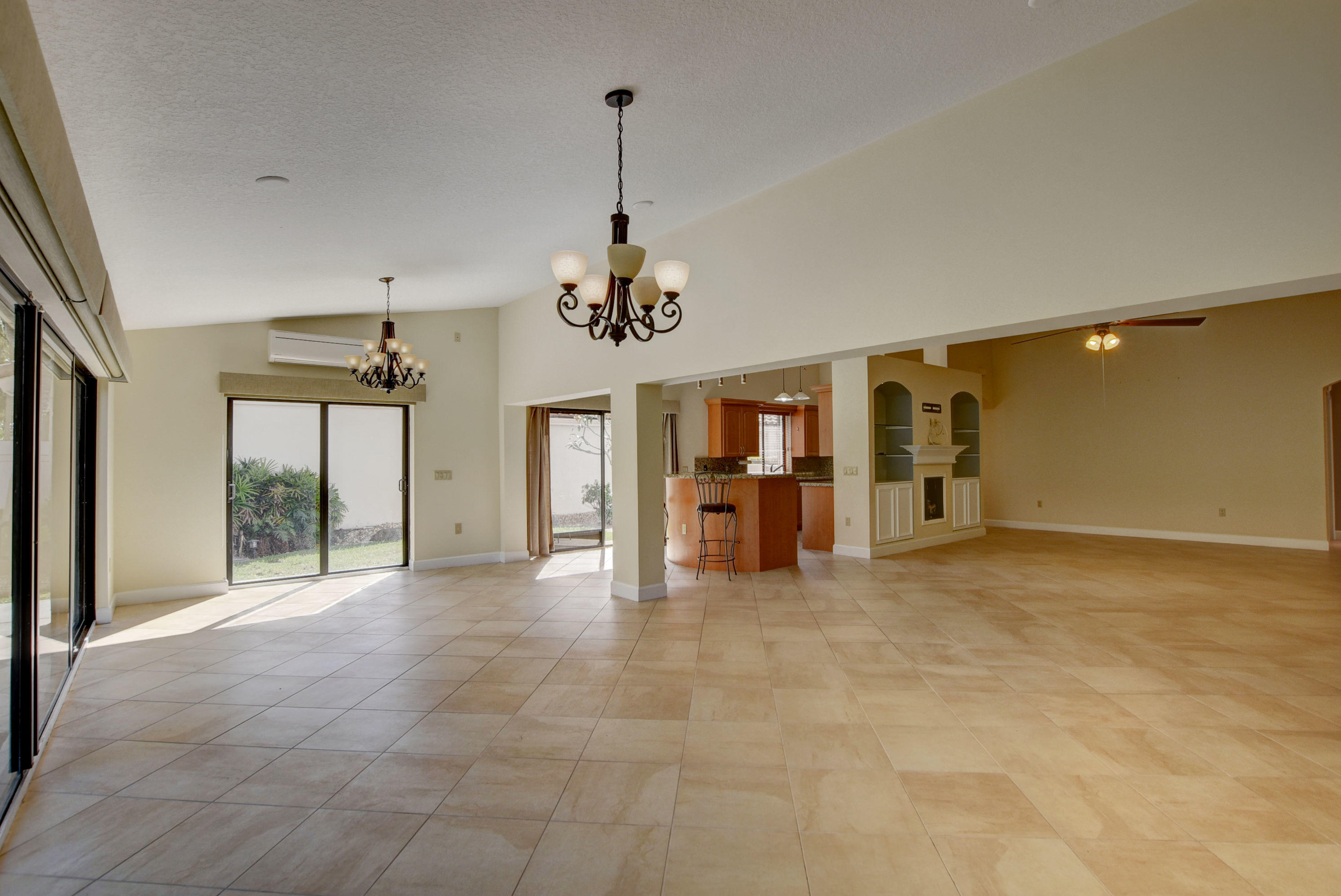2602 Mohawk Circle West Palm Beach, FL 33409 - Photo 11 of 39 a view of an empty room with window and cabinet