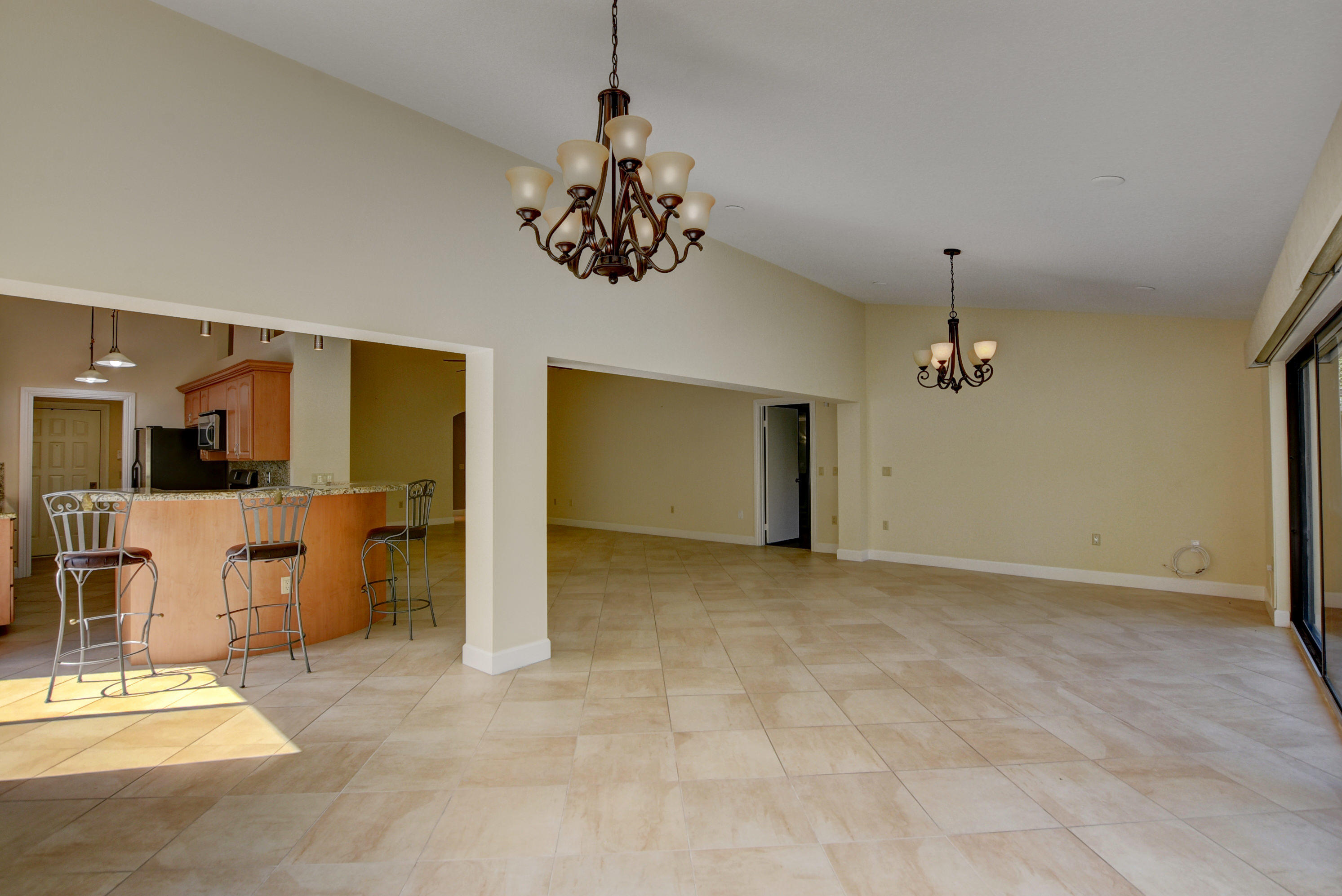2602 Mohawk Circle West Palm Beach, FL 33409 - Photo 12 of 39 a view of a room with a chandelier