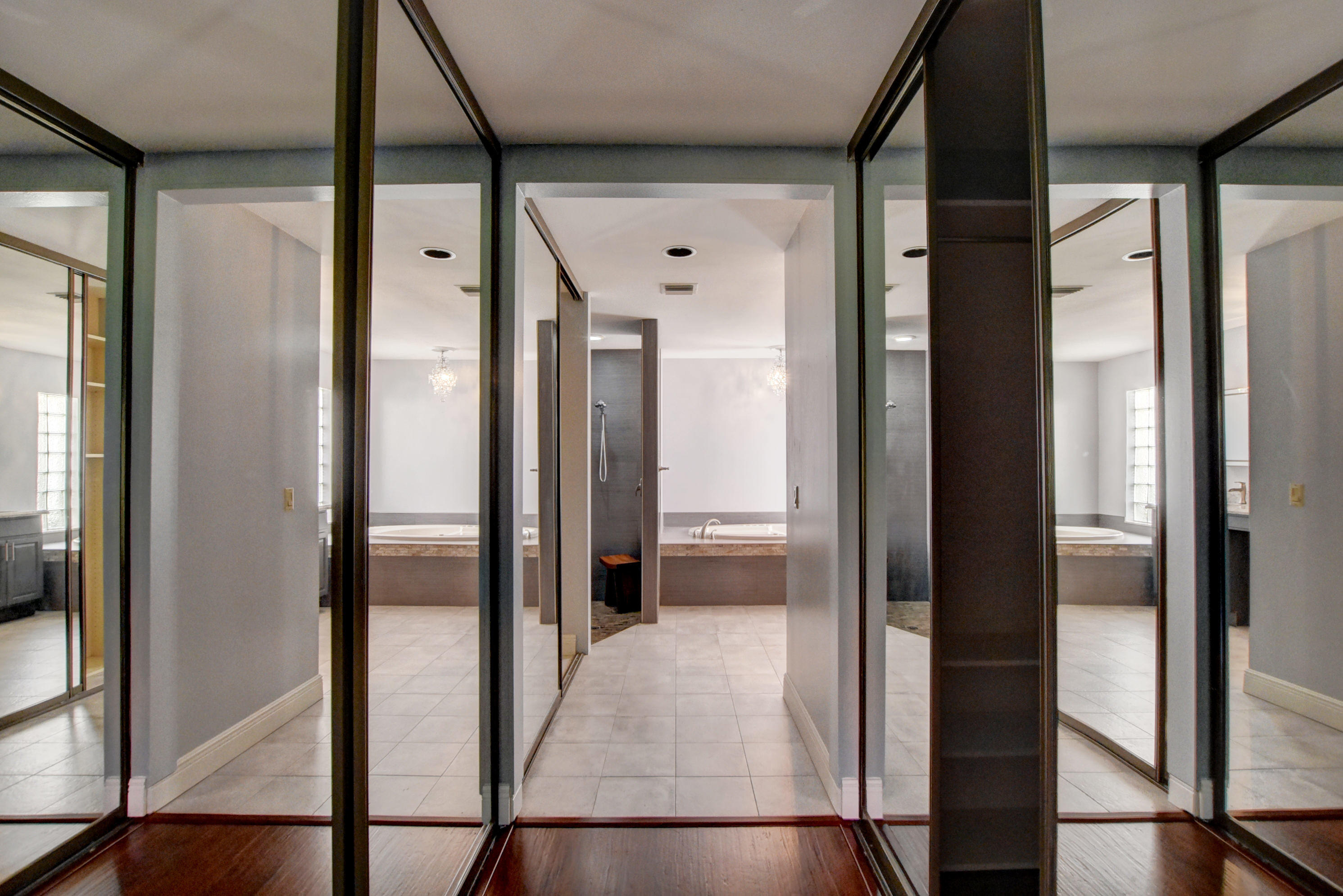 2602 Mohawk Circle West Palm Beach, FL 33409 - Photo 17 of 39 a view of a bathroom with a glass door