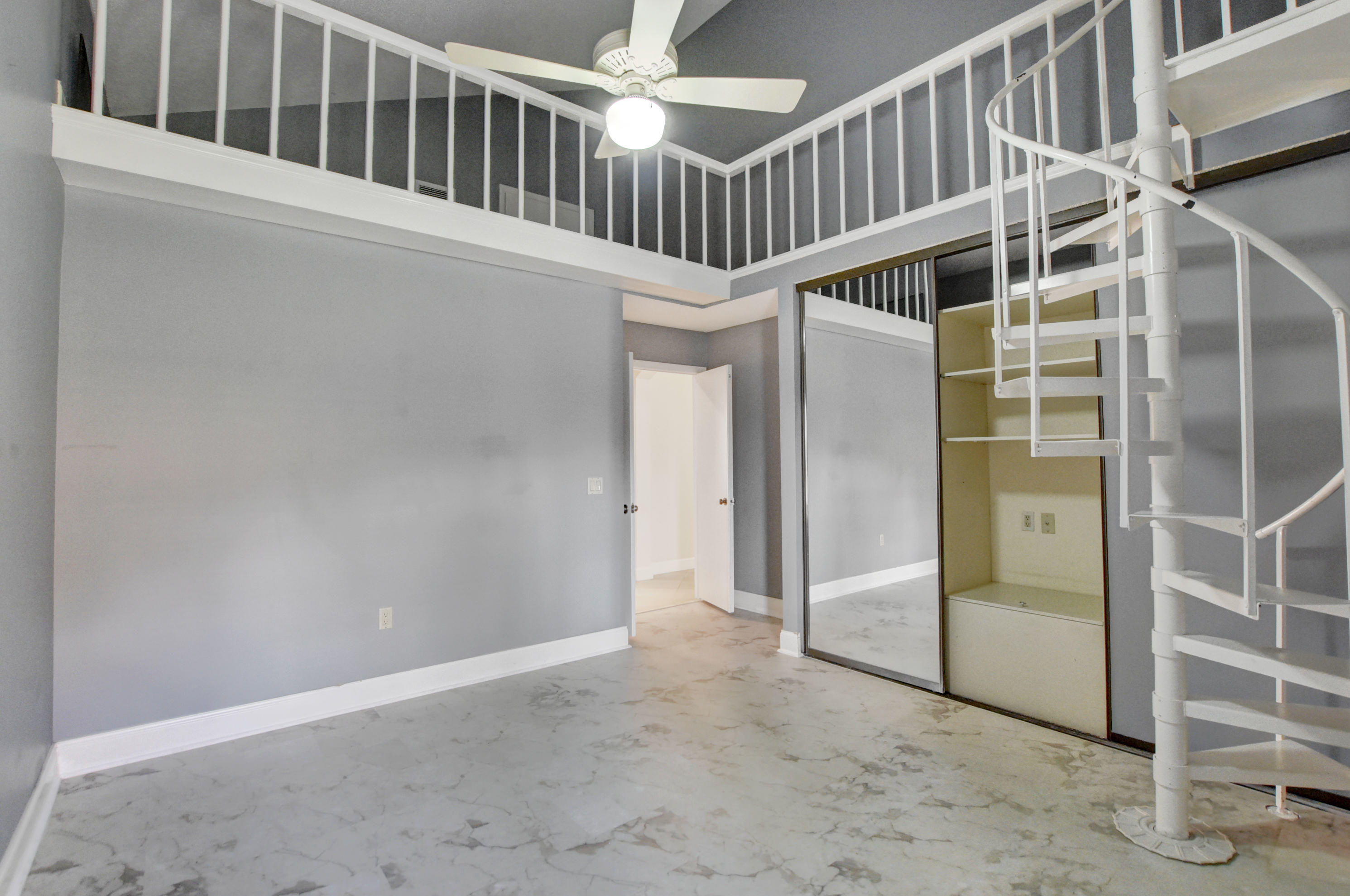 2602 Mohawk Circle West Palm Beach, FL 33409 - Photo 22 of 39 a view of an entryway with staircase