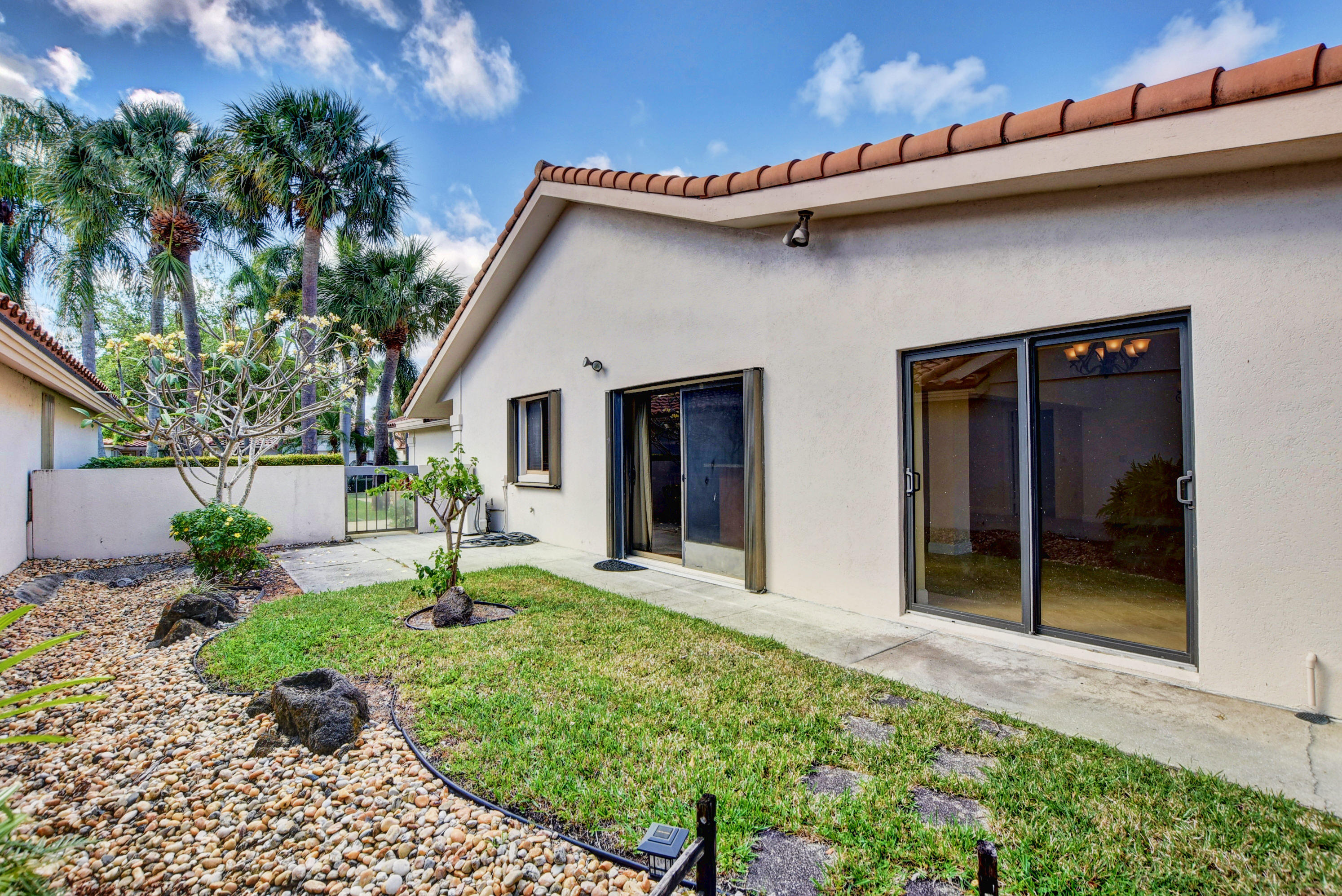 2602 Mohawk Circle West Palm Beach, FL 33409 - Photo 27 of 39 a house that has a lot of plants in it