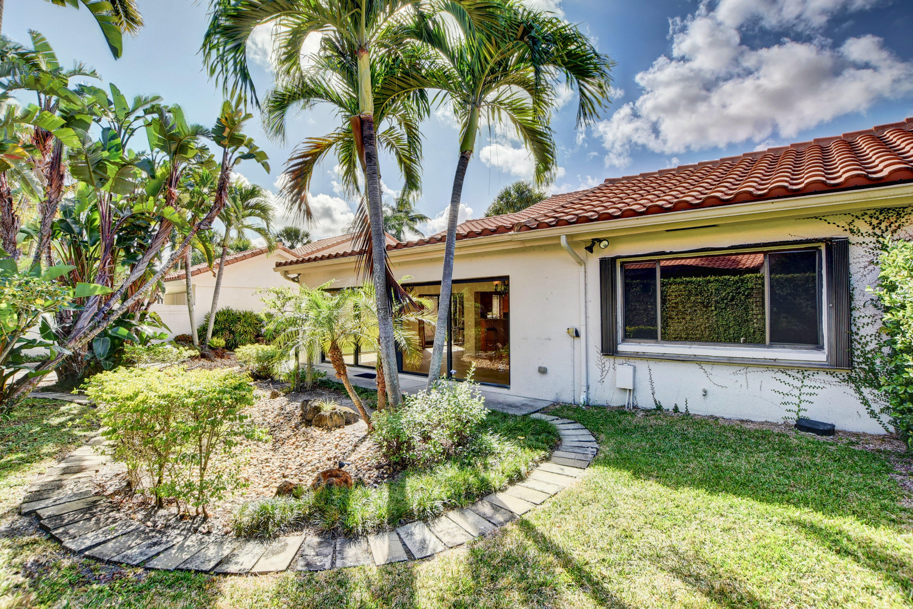 2602 Mohawk Circle West Palm Beach, FL 33409 - Photo 33 of 39 a view of a house with a yard