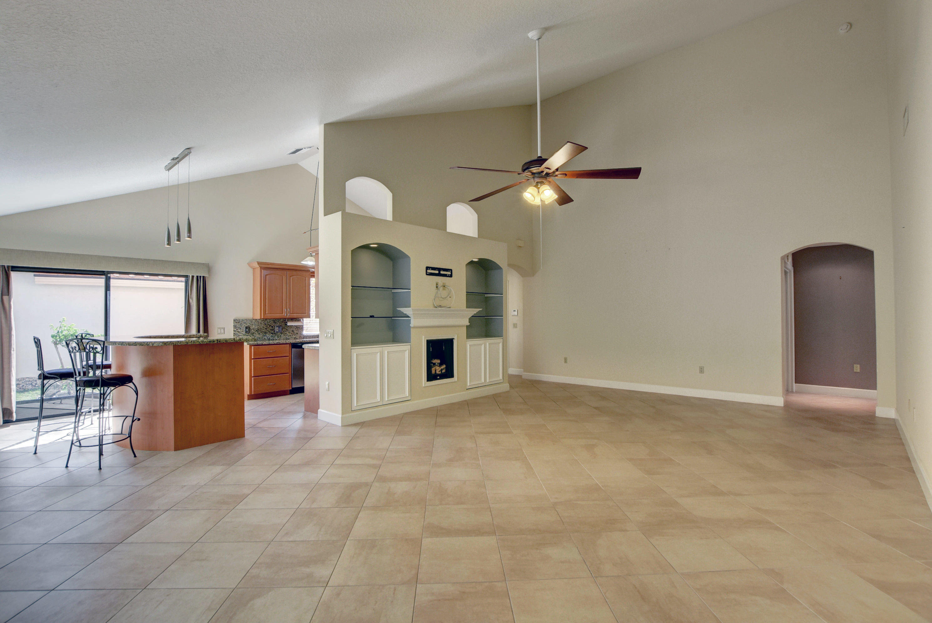 2602 Mohawk Circle West Palm Beach, FL 33409 - Photo 8 of 39 a view of a livingroom with furniture and chandelier fan