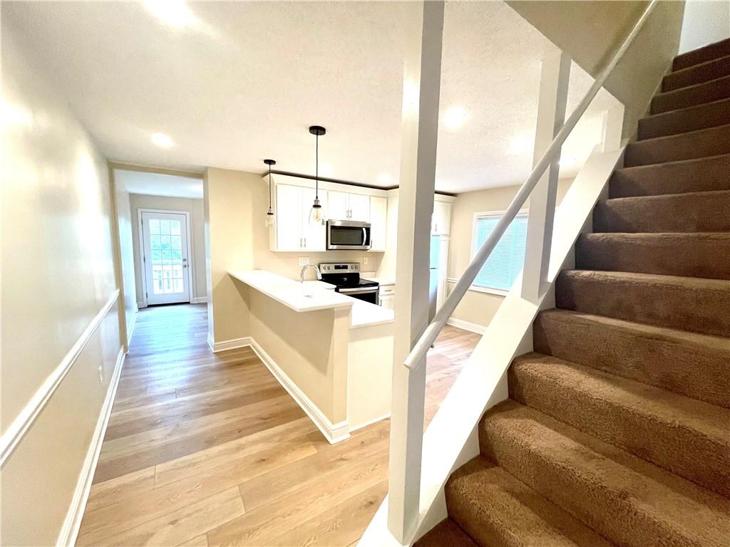 433 Augusta Street Pittsburgh, PA 15211 - Photo 5 of 21 a view of entryway and hall with wooden floor