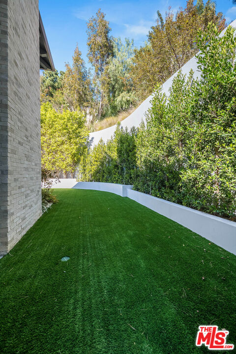 1348 Marinette Road Pacific Palisades, CA 90272 - Photo 25 of 50 a view of yard with grass and trees