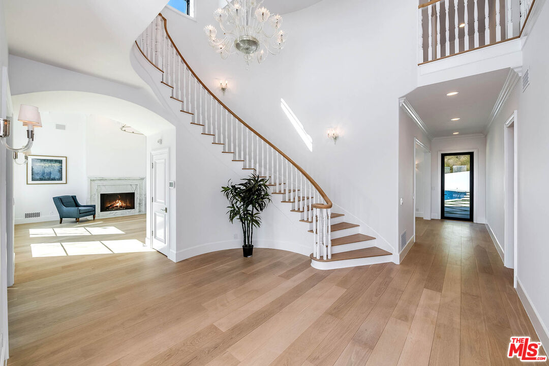 1348 Marinette Road Pacific Palisades, CA 90272 - Photo 4 of 50 a view of entryway and hall with wooden floor