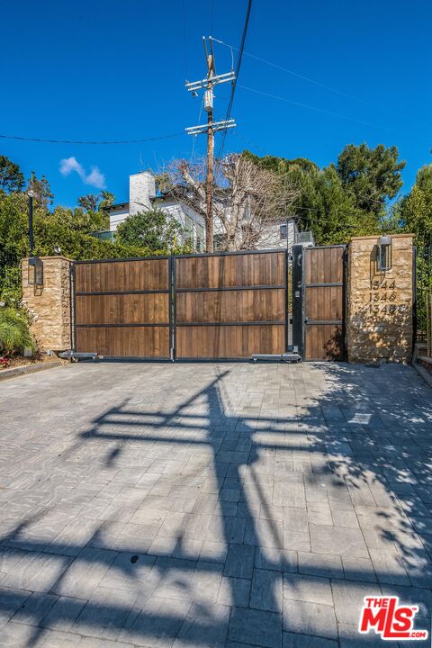 1348 Marinette Road Pacific Palisades, CA 90272 - Photo 50 of 50 a view of a street with a building in the background