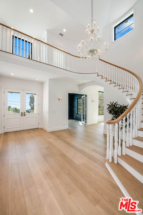 1348 Marinette Road Pacific Palisades, CA 90272 - Photo 5 of 50 a view of an entryway with wooden floor