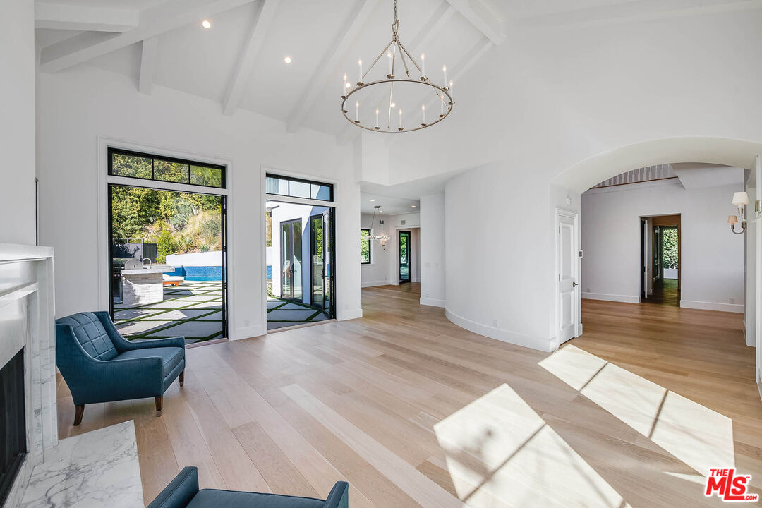 1348 Marinette Road Pacific Palisades, CA 90272 - Photo 7 of 50 a view of a livingroom with furniture and windows