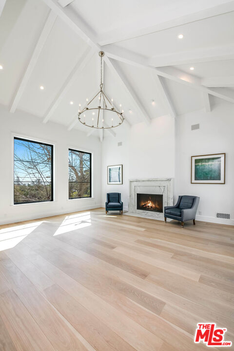 1348 Marinette Road Pacific Palisades, CA 90272 - Photo 8 of 50 a view of livingroom and a fireplace