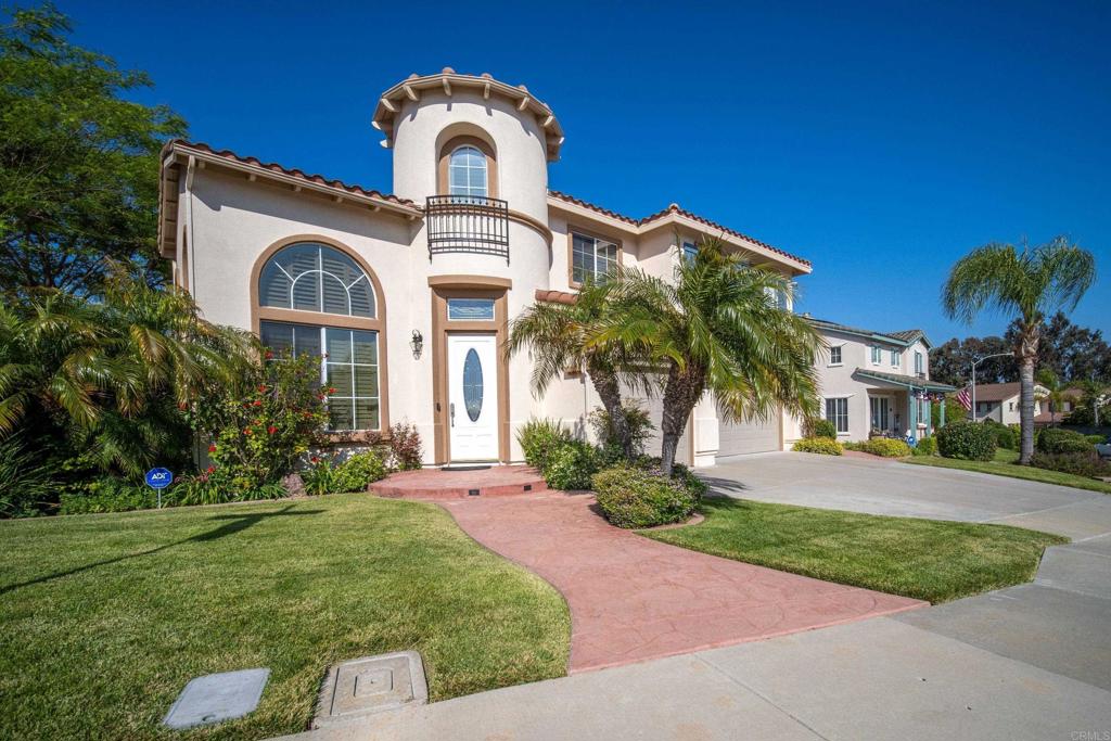 2627 El Granada Road Chula Vista, CA 91914 - Photo 1 of 1 a front view of a house with a garden