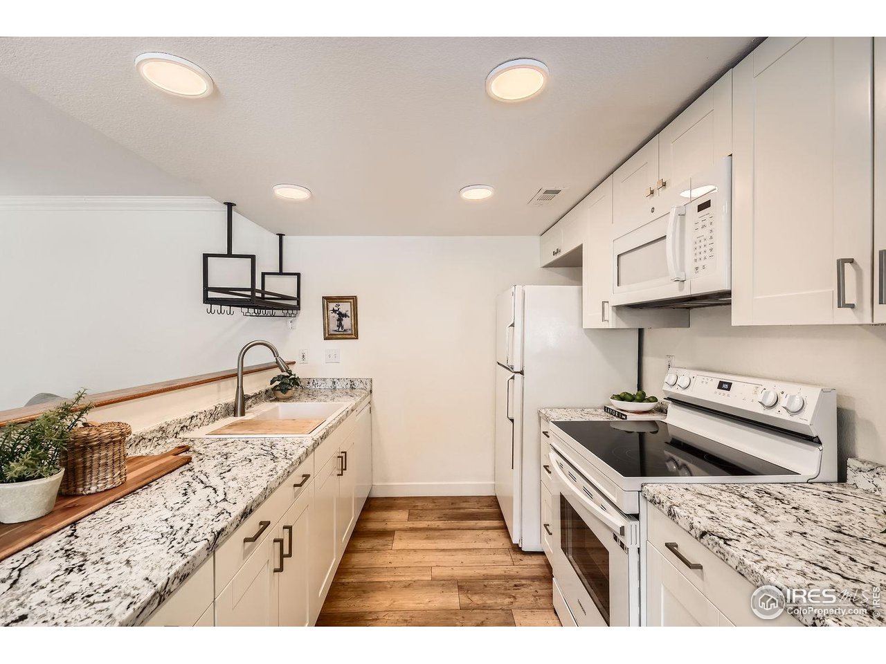 1225 West Prospect Road, Unit T62 Fort Collins, CO 80526 - Photo 5 of 15 Kitchen
