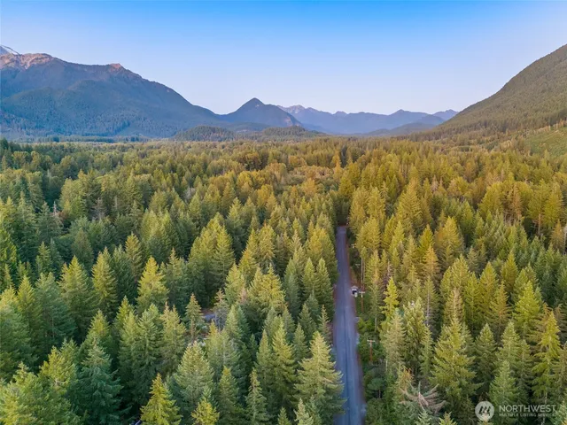 a view of a city with mountains in the background