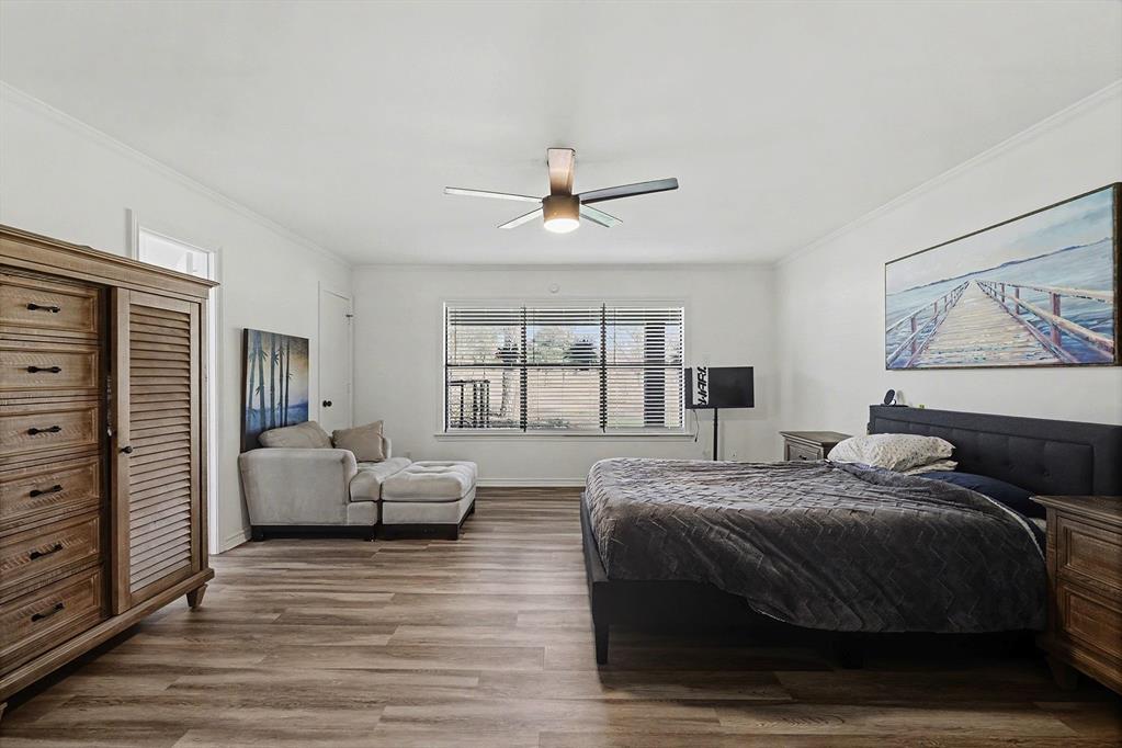 6746 Talbot Parkway Dallas, TX 75232 - Photo 20 of 34 a bedroom with a bed and window