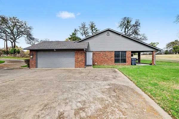 a front view of house with yard